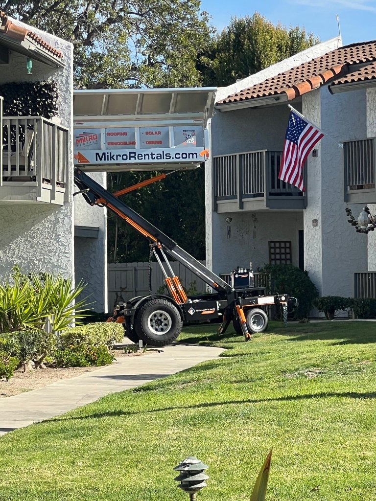Trash Rocket chute on building exterior