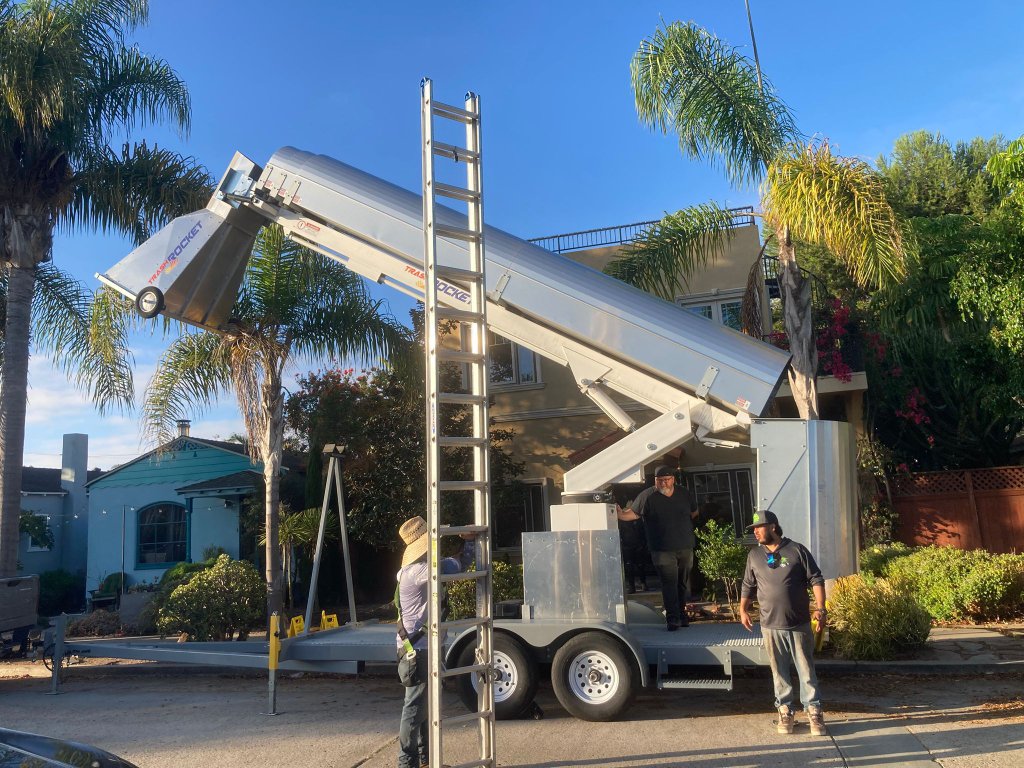 Trash Rocket chute installation with dumpster