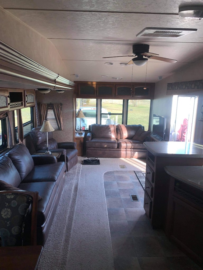 Wildwood open living space with multiple seating areas