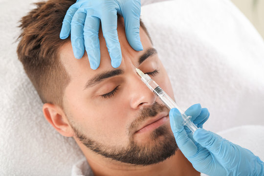 Man receiving Botox treatment