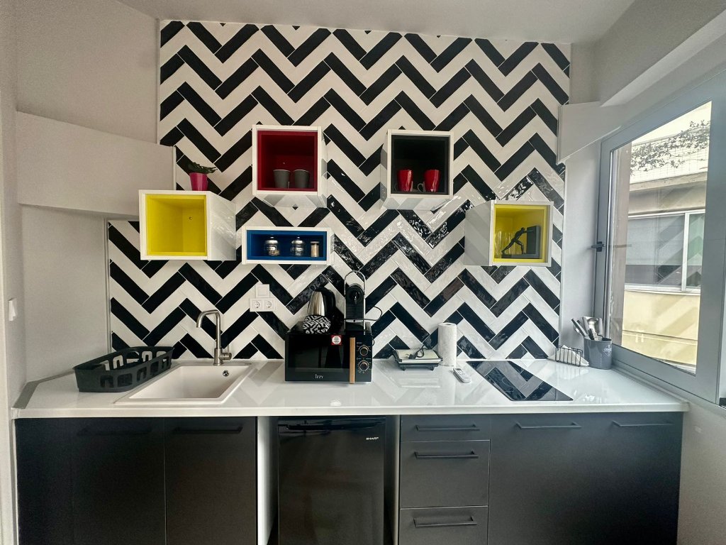 Kitchen with colorful shelving
