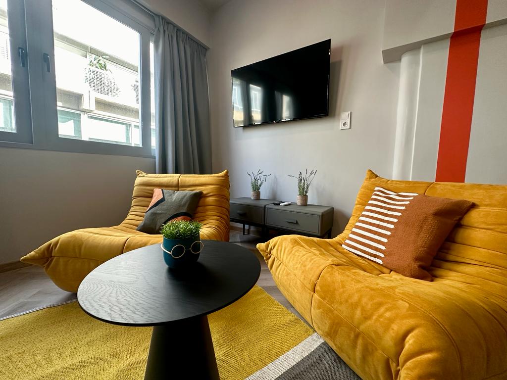 Living room with yellow sofa set