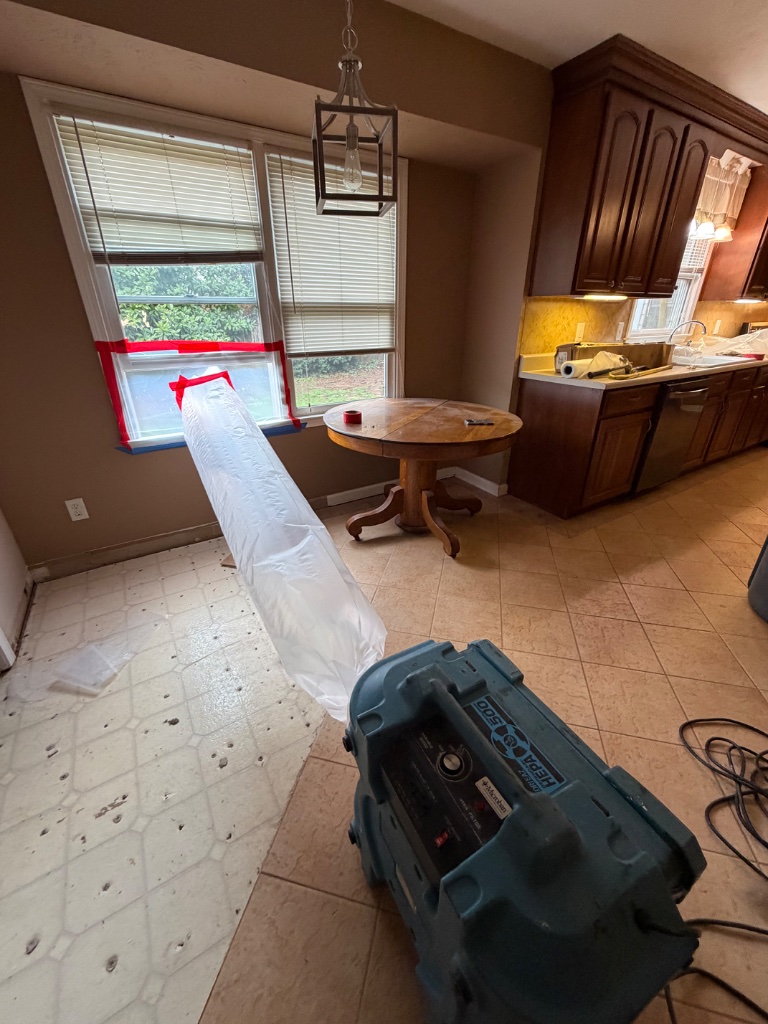 Negative air pressure containment setup for asbestos abatement
