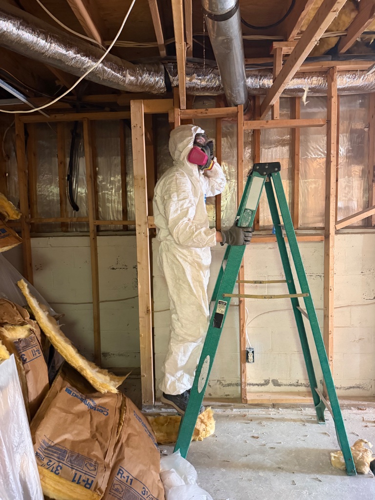 Asbestos removal — HEPA air scrubber and negative pressure setup