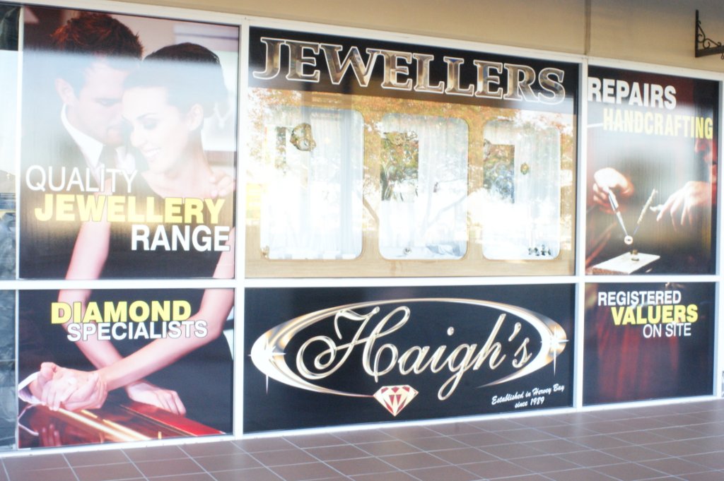 Window graphics and vinyl lettering manufactured by Terry Signs for a Bundaberg shopfront