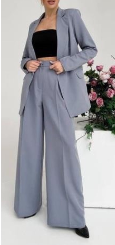 Female performer outfit example - grey blazer and pants