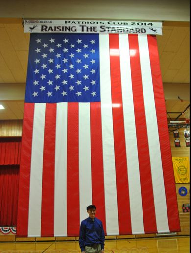Flag installation in school gymnasium