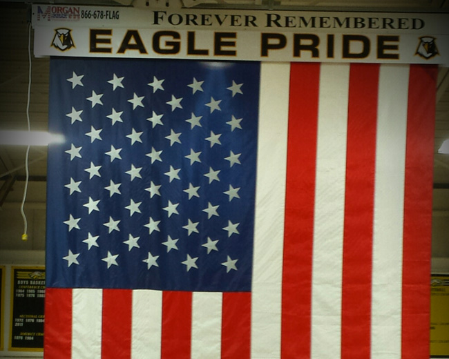Flag installation in school gymnasium