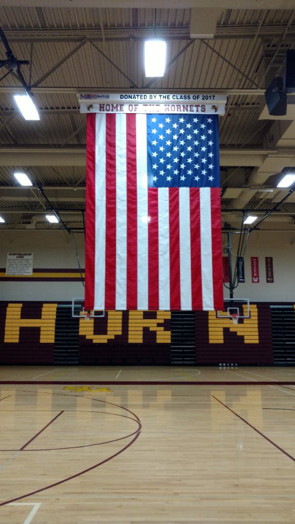 Flag installation in school gymnasium