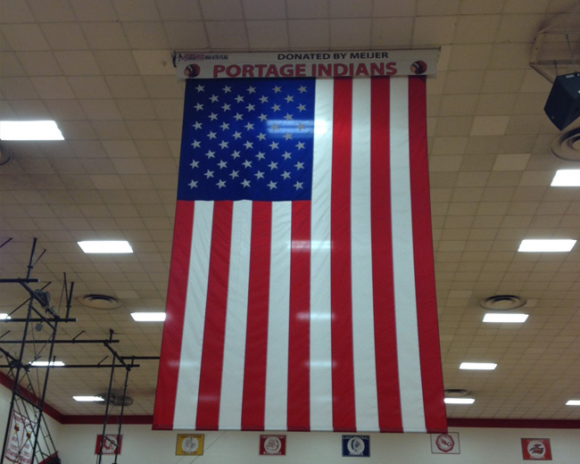 Flag installation in school gymnasium