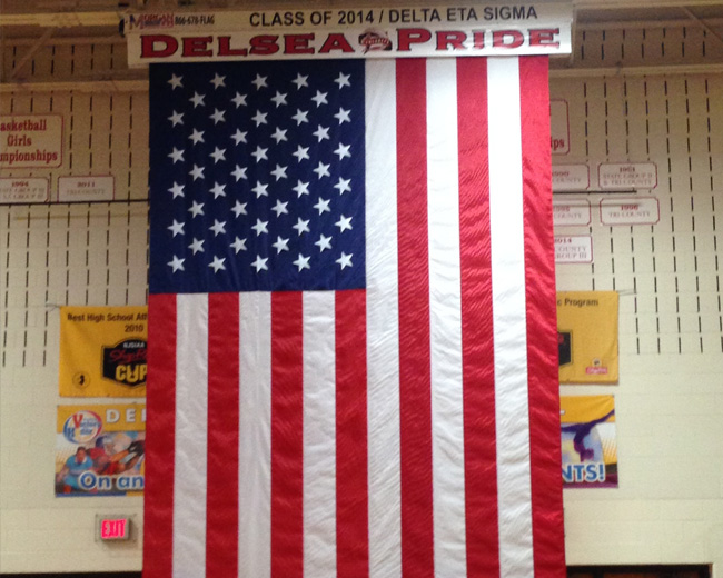 Flag installation in school gymnasium