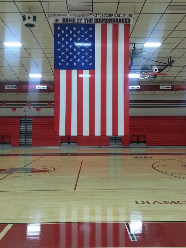 Flag installation in school gymnasium