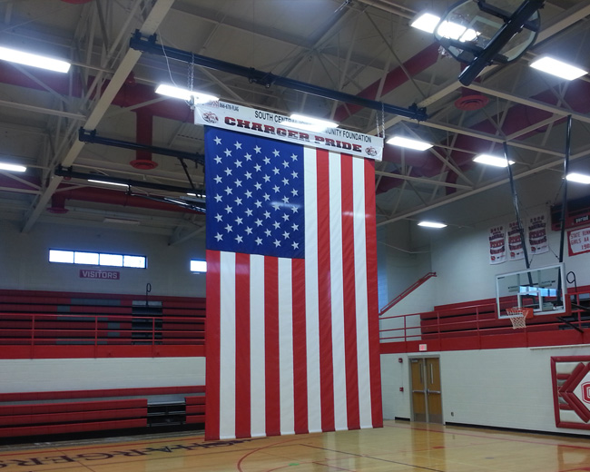 Flag installation in school gymnasium