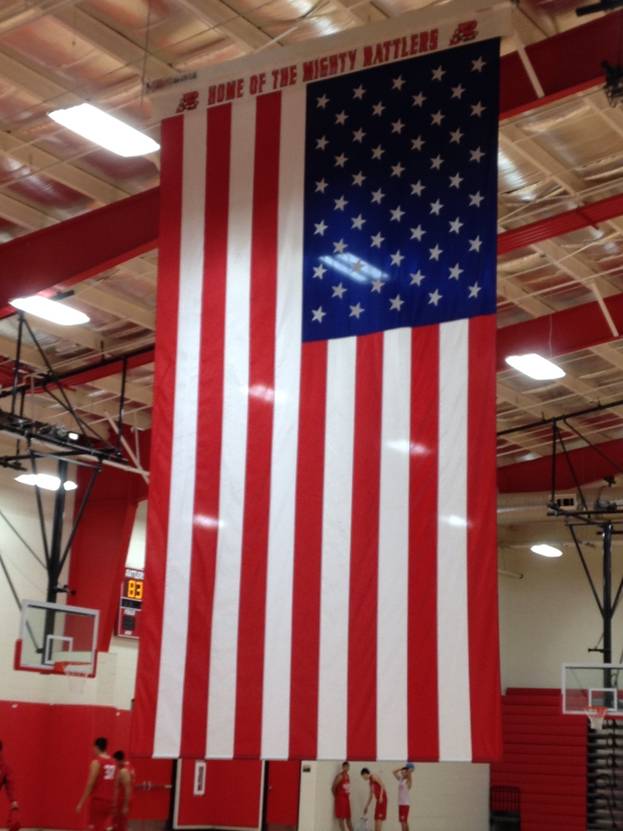 Flag installation in school gymnasium