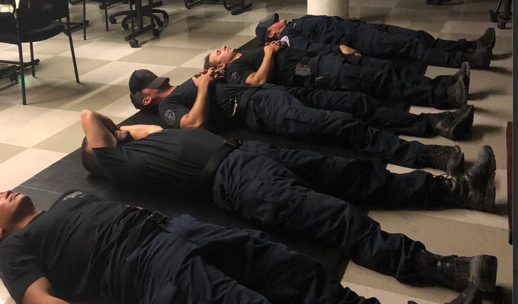 SFPD Special Ops officers in meditation session with Lane Kennedy