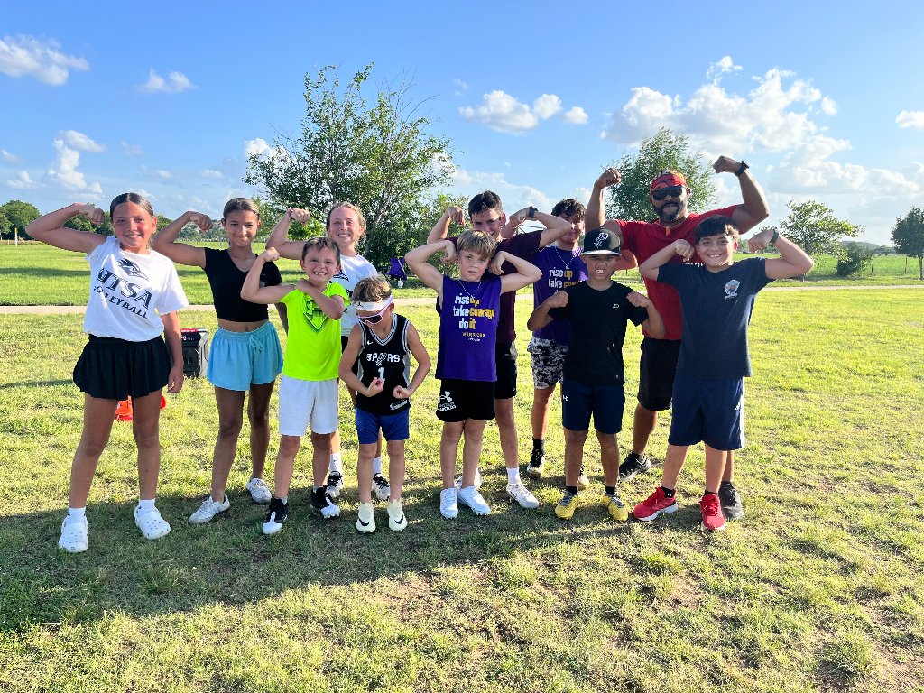Coach Mike with youth athletes