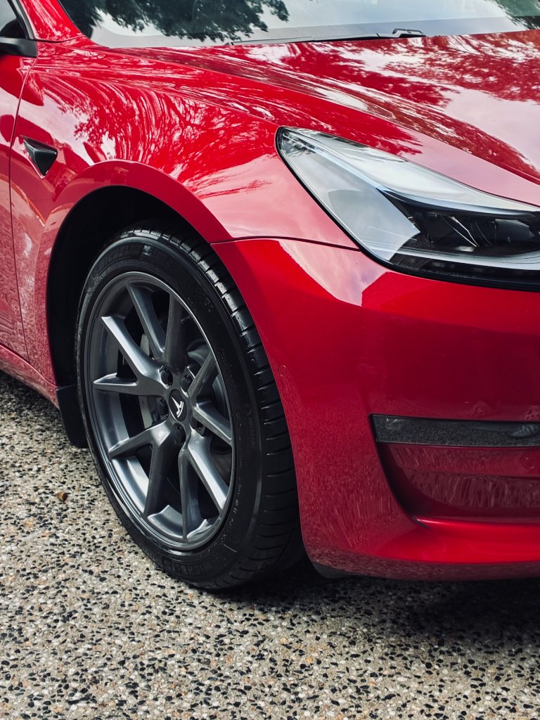 Brilliant red Tesla detail