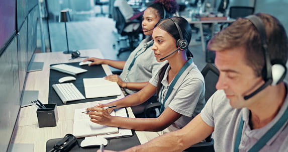 Customer support team with headsets