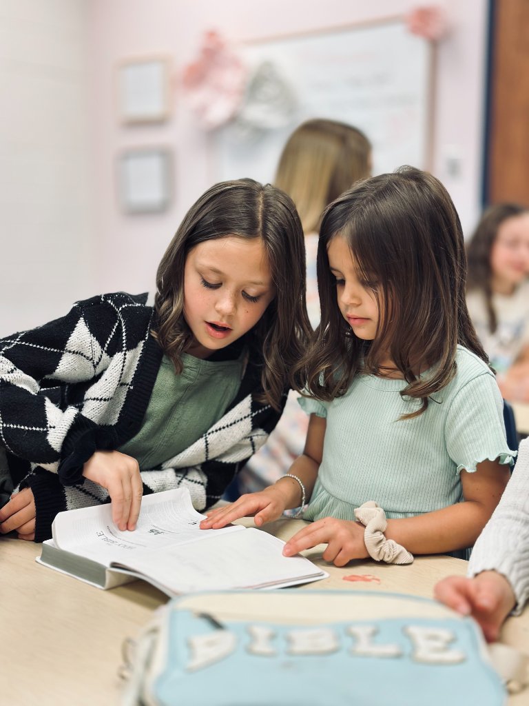 Children reading Bible together during children's ministry at FBC Gate City