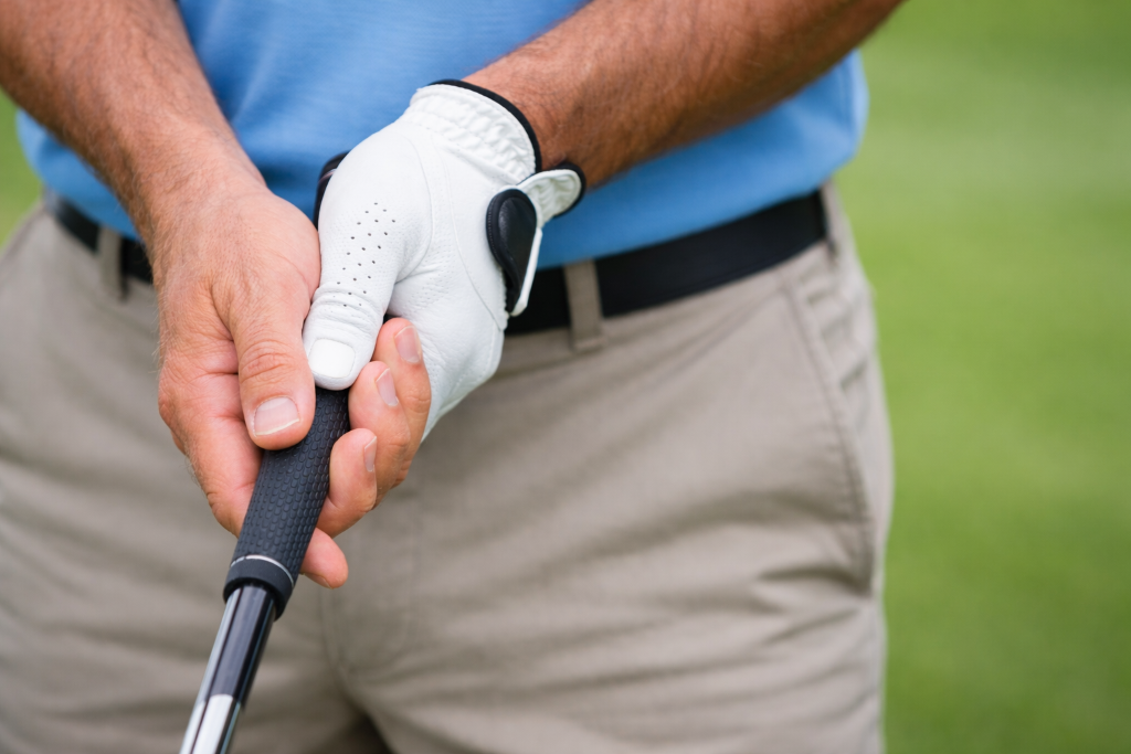Golfer's grip in bright daylight