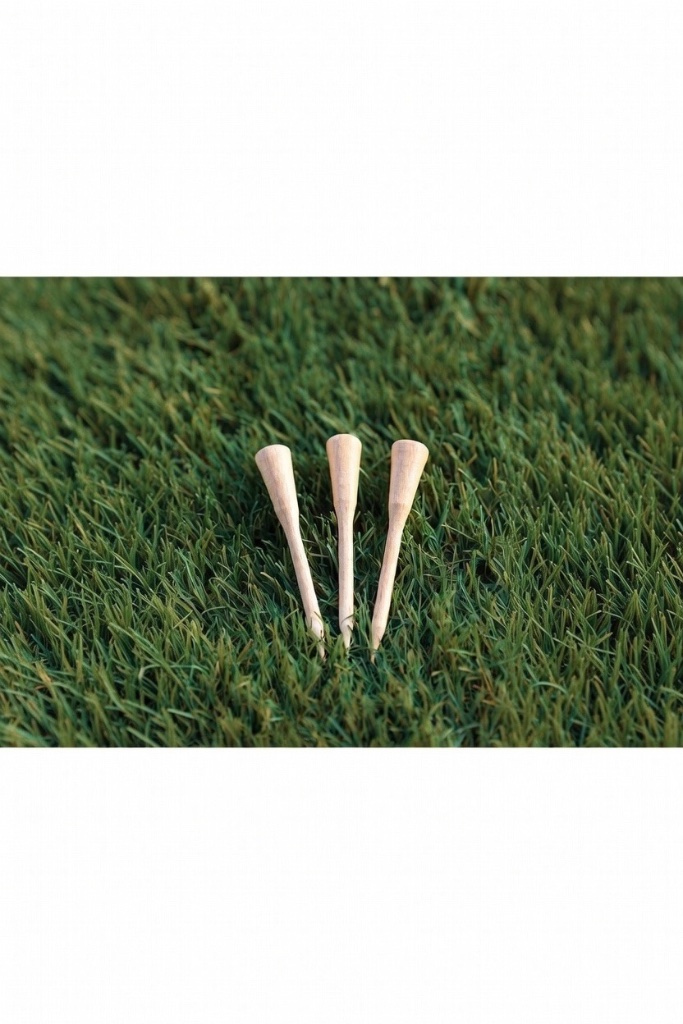 Golf tees on green turf