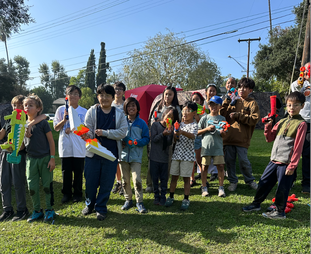 Large nerf party group Los Angeles - kids at outdoor park with nerf blasters for birthday celebration