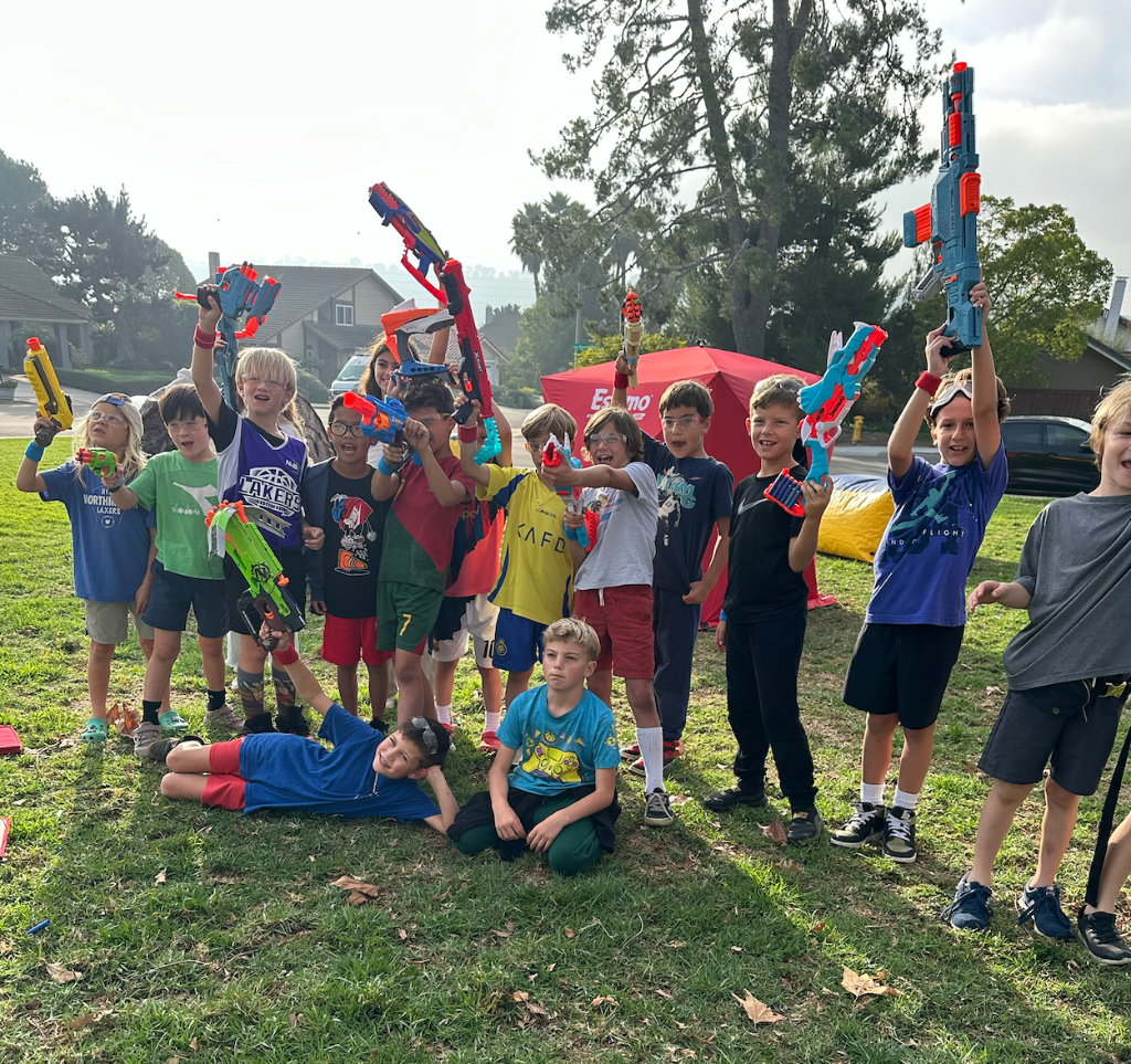 Group nerf party photo Los Angeles - kids celebrating with nerf guns at mobile entertainment event