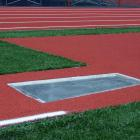 Pole vault runway and landing pit construction at athletic complex