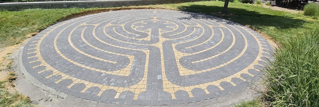 Custom paver labyrinth design installed at commercial property by Draw Enterprises