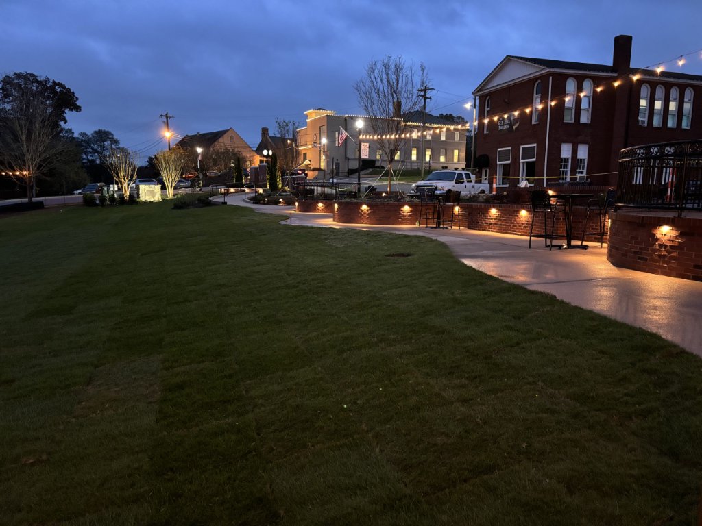 Downtown commercial landscaping with decorative lighting and hardscape installation