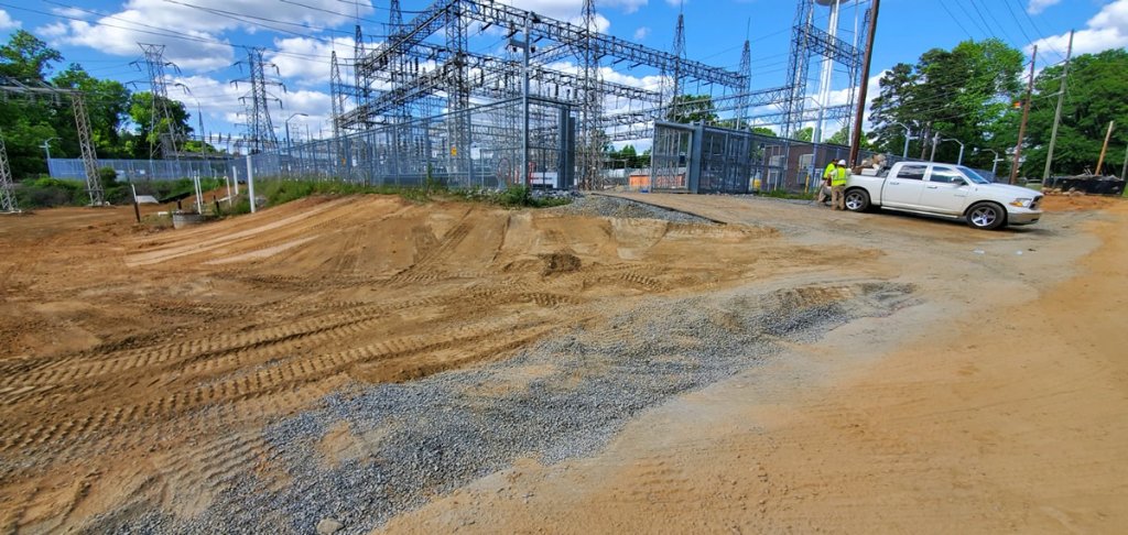 Electrical substation site grading and earthwork with power infrastructure