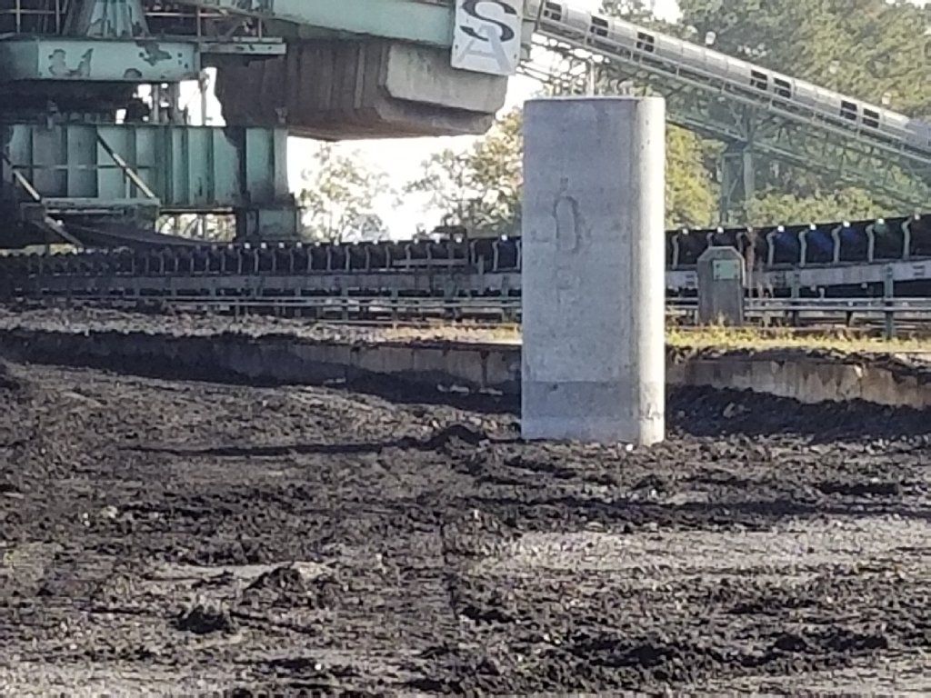 Industrial concrete pier foundation at coal processing facility