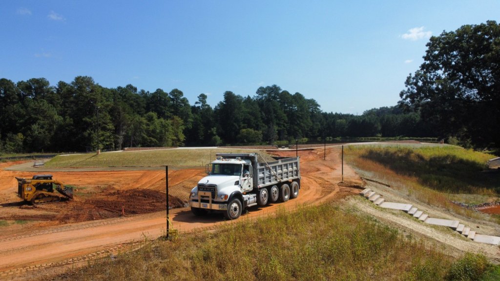 Aerial view of commercial site development and grading project in progress