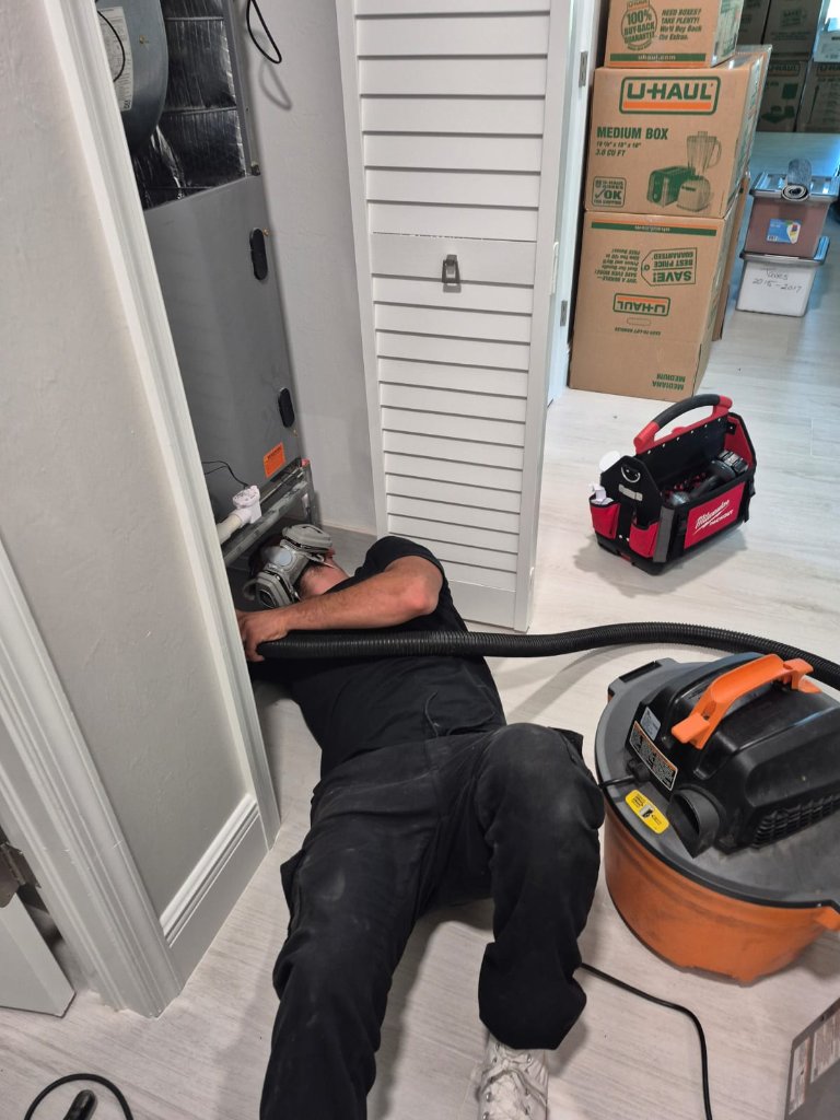 Air duct cleaning technician working in Southwest Florida