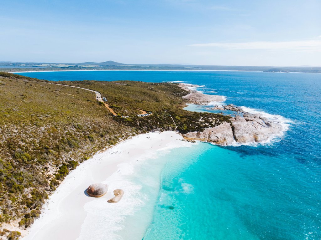 Pristine white sand beach and crystal clear turquoise water on South Australian coast — premium beachside Airbnb property location requiring fire evacuation diagram compliance