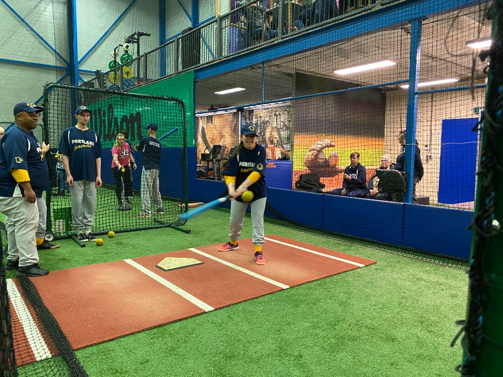 Jeugdtraining in de batting cages