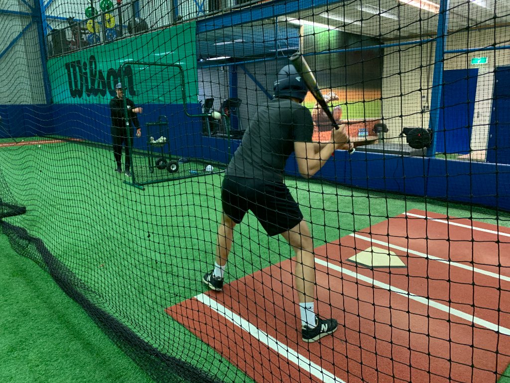 Speler in batting cage