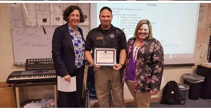 Roman Buchberger receiving community recognition