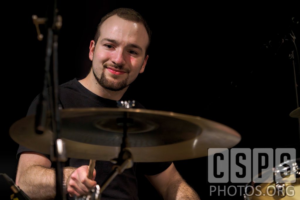 Dawson performing on drums