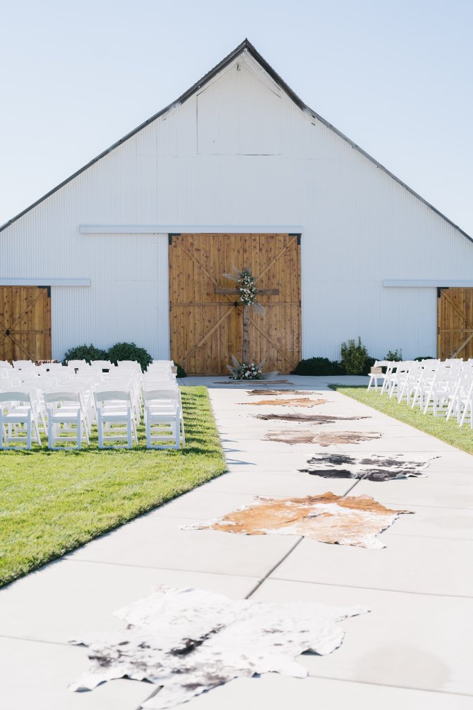 White Barn Aisle with Cowhides