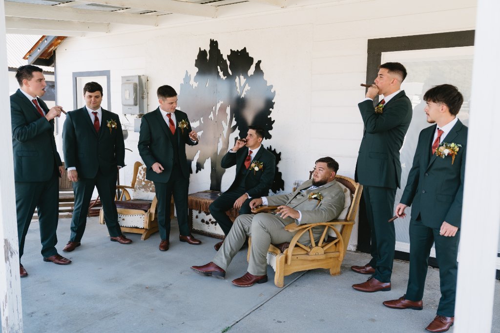 Groomsmen in White Room