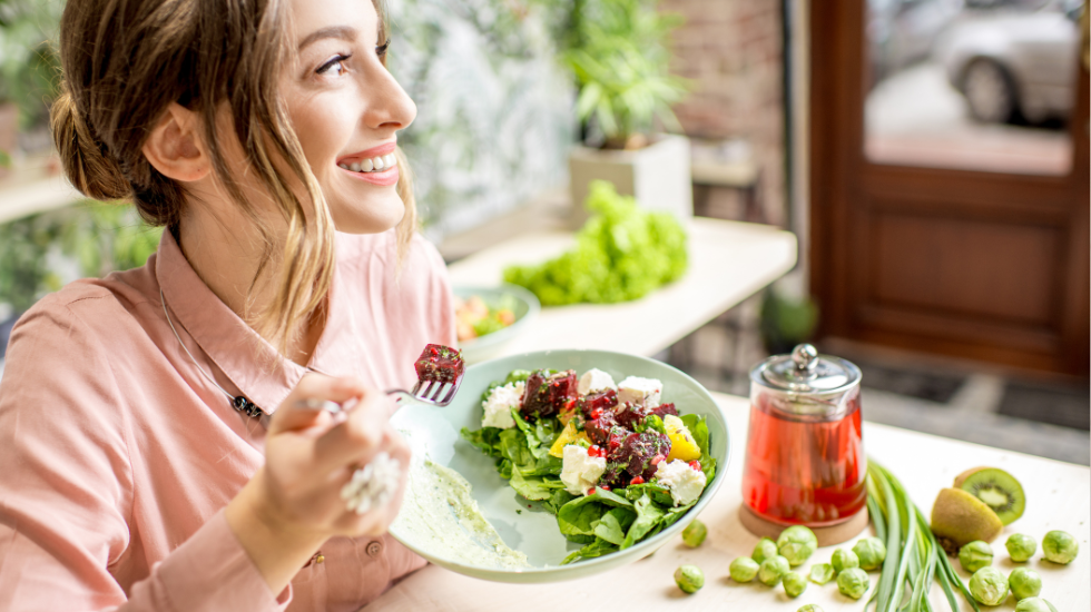 Woman eating healthy salad Ozempic weight loss success lifestyle meal