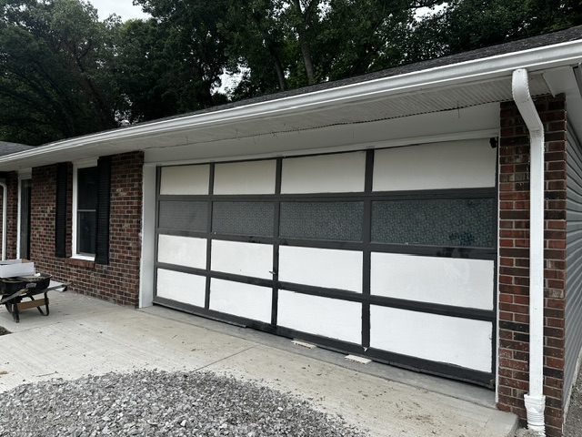 Sleek modern black door before