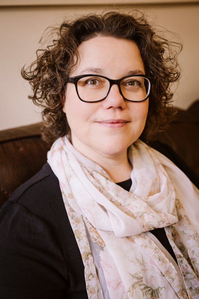 Professional portrait of Heather Krimsly, LCSW, trauma therapist in her office