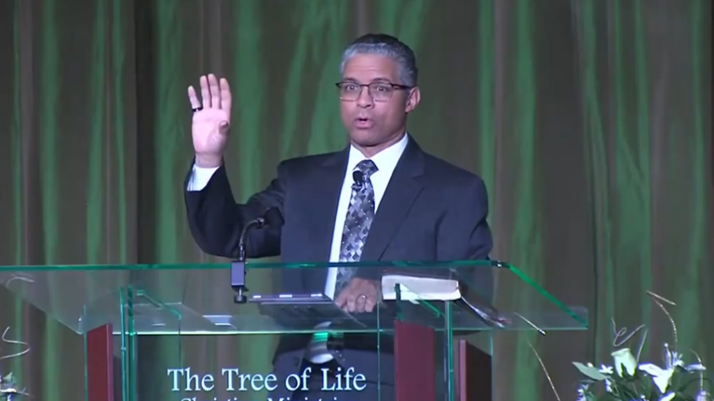 Roscoe speaking on stage