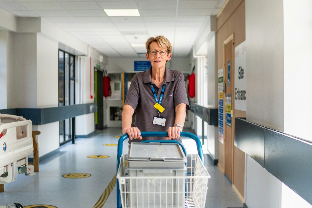 Healthcare workers in uniform collaborating