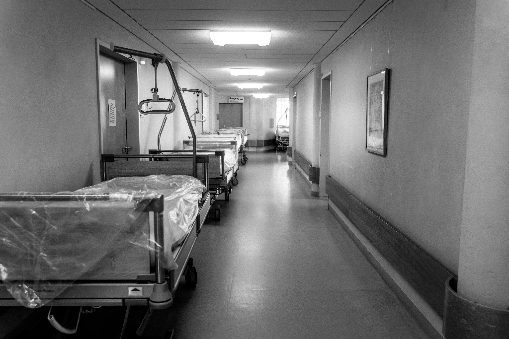 Hospital corridor with beds