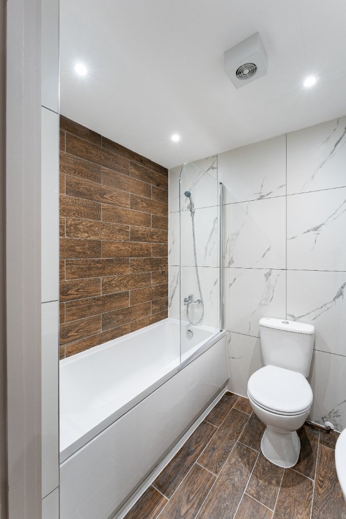 Apartment hallway leading to bathroom
