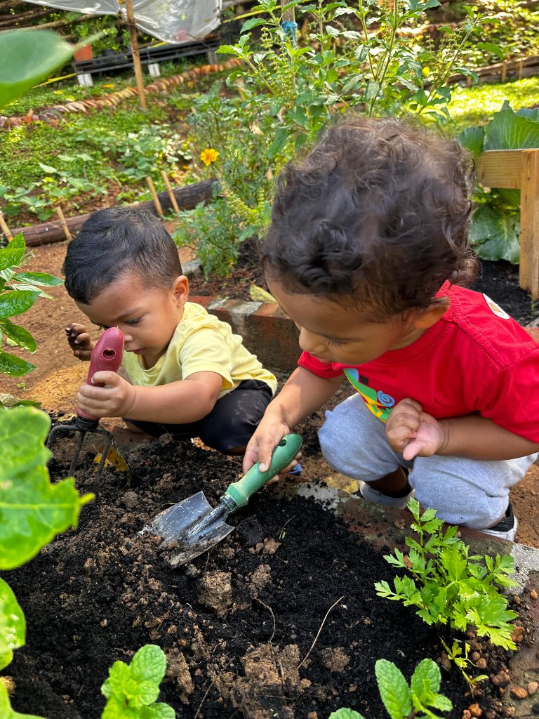Children gardening together