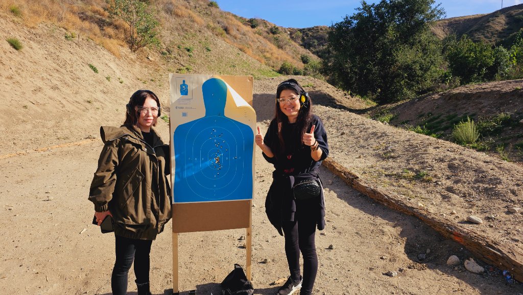 Students celebrating successful target practice